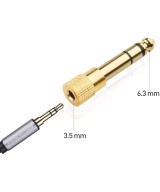 Adaptador de audio salida macho 1/4" (6.35mm)  y entrada hembra de 3.5mm